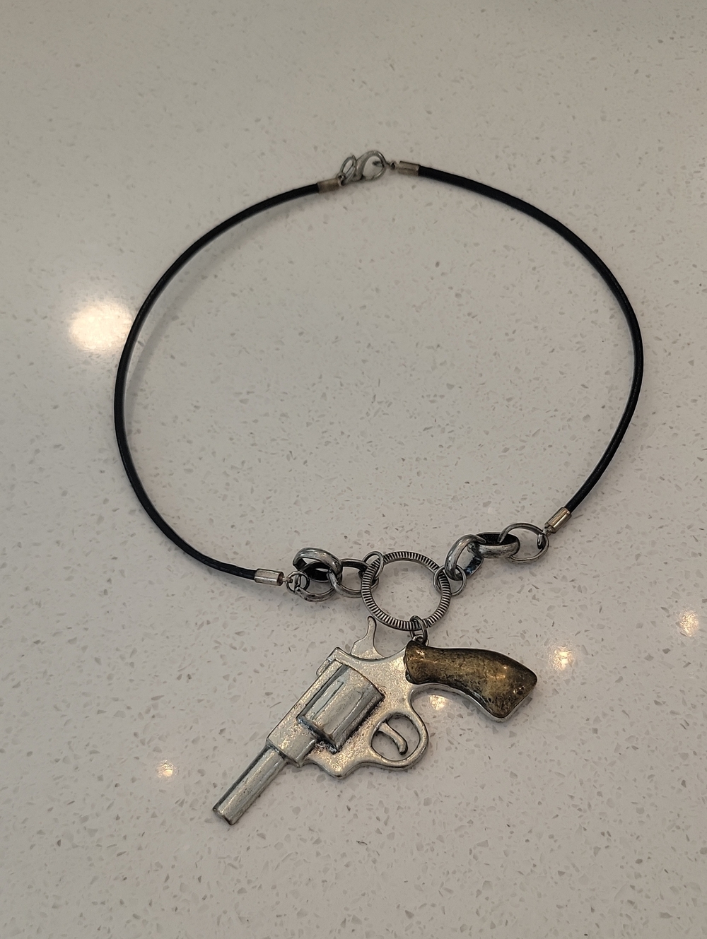 Black Leather Cord Necklace with Silver-Tone Revolver Pendant